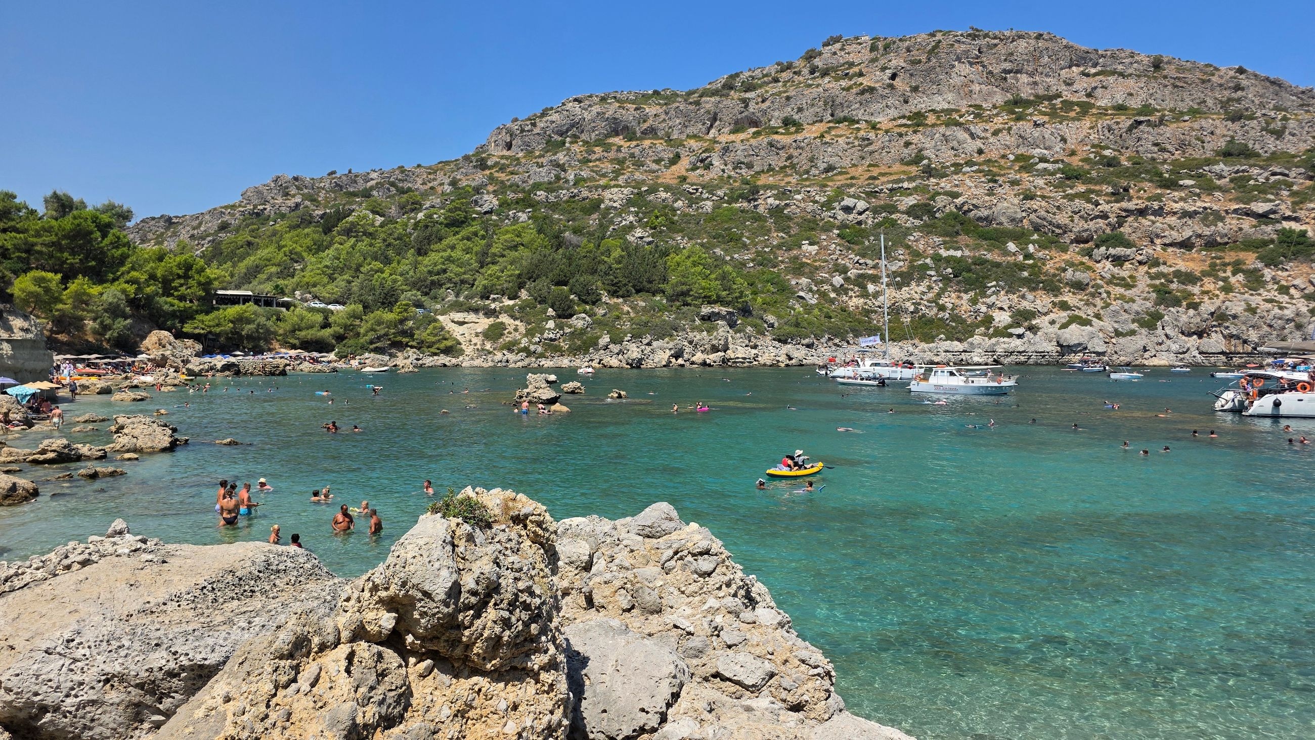 A picturesque beach with clear blue water